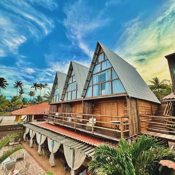 Pousada Beach House Coqueirinho โรงแรมในจากูมา