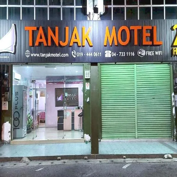 OYO 90937 Tanjak Hotel โรงแรมในKampong Naga