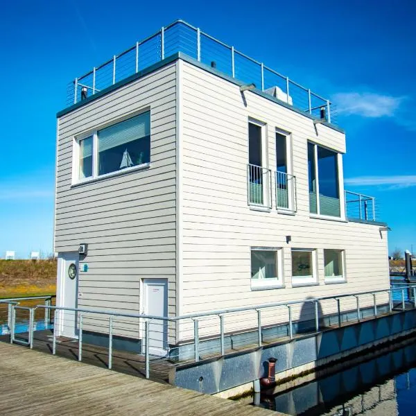 Schwimmendes Haus - An Bord 1, hotel in Olpenitz