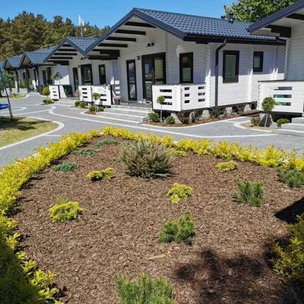 Domki Pod Szyszką 500m od morza, hotel di Rowy