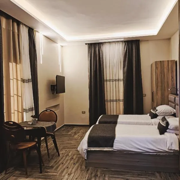 Royal Elegance Room, hotell i ‘Ezbet Sharikât Wardan