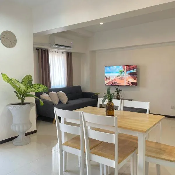 Mactan Airport Affordable Cozy Loft Condo by A&C, хотел в Pusok