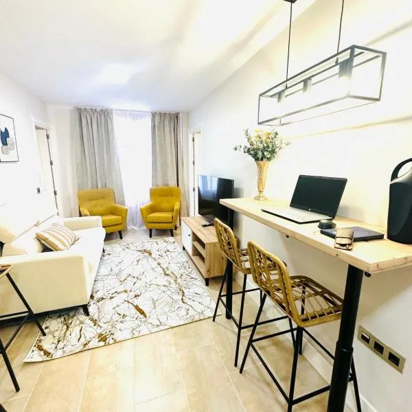 Apartamentos Puente Romano Suites Parking Gratis, hotel in Merida