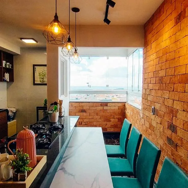 9 Andar - Estilo industrial Moderno e Aconchegante、ウベルランジアのホテル