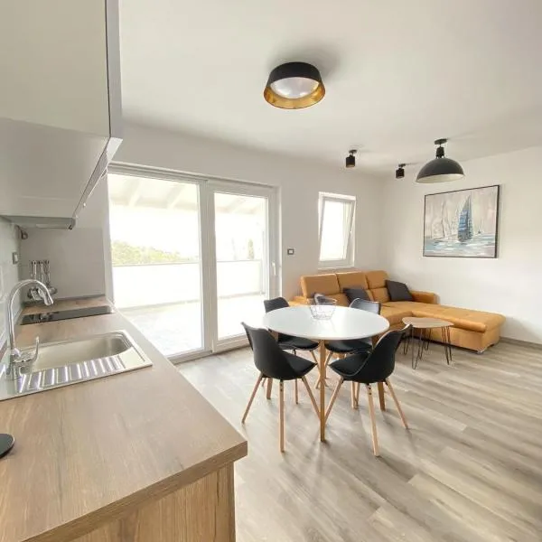 Apartments Puntica 2+1 person Rab, hotel in Rab