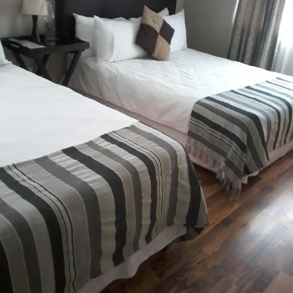 Palm Springs B and B and Self Catering, hotel in Butterworth