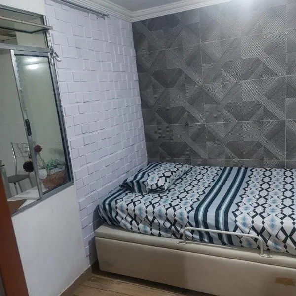 Casa simples e aconchegante / Banho quente, hotel v destinaci Contagem