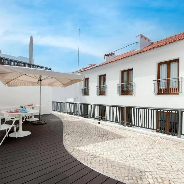 Porta da Arrábida Suites โรงแรมในปัลเมลา