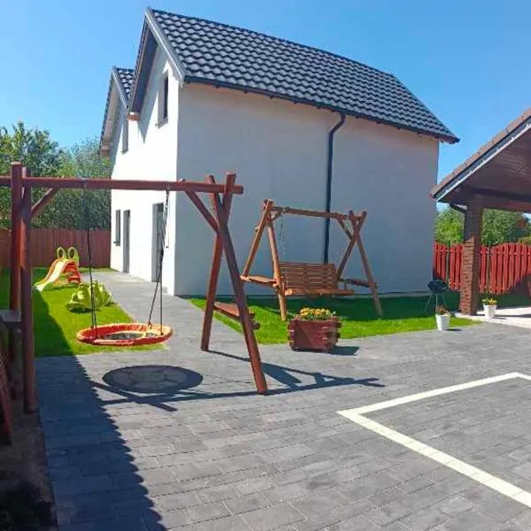 Apartamenty i domki na Jantarowej – hotel w Sarbinowie