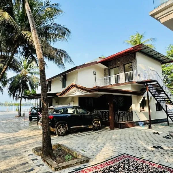 THE BACKWATER HOMESTAY, hotel di Bārkūr