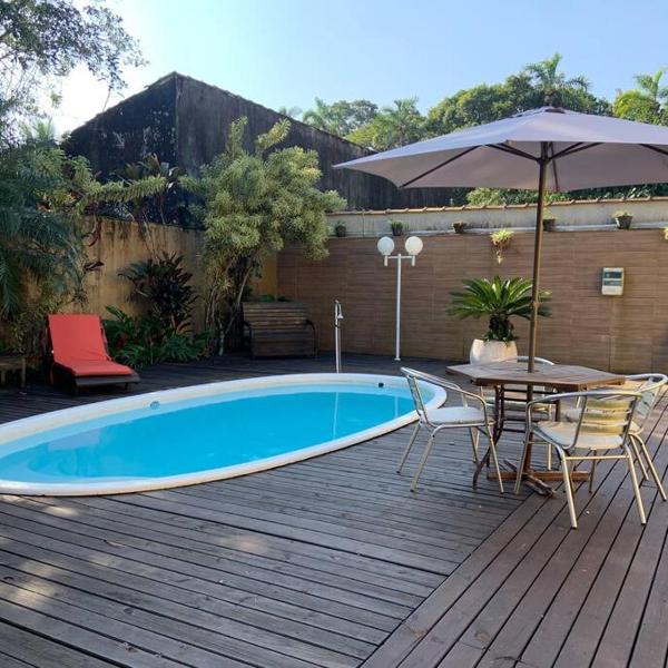 Casa Oceano perto da praia e completa com churrasqueira e piscina
