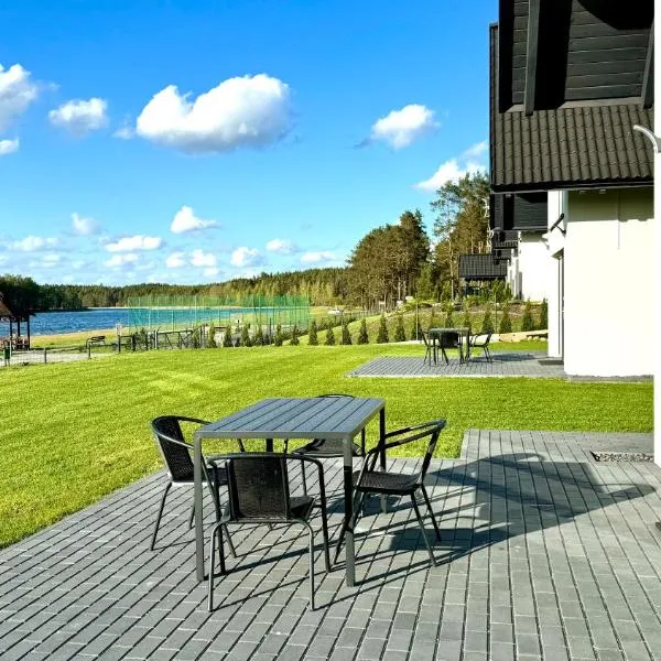 Domki nad jeziorem u Izy, hotel in Załęze