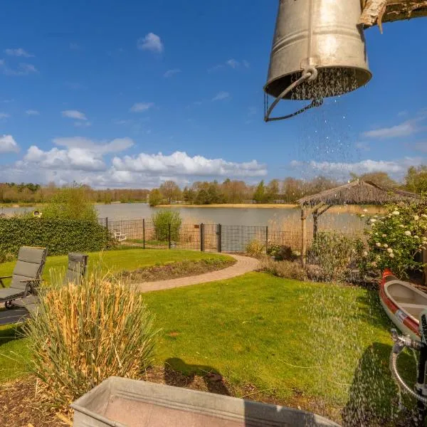 Drents Genieten - Lavendelheide met uitzicht op het water, hotell i Erm