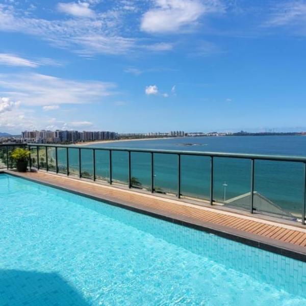 Flat Frente ao Mar em Camburi Rooftop com Piscina e Vista Incrível