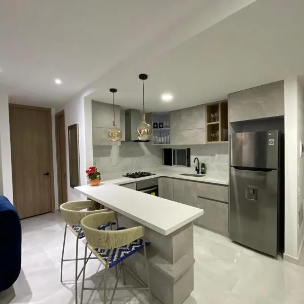 Eleva tu Estadía: Apartamento Moderno con Toques Únicos en la Mejor Ubicación Ibague - Tolima、イバゲのホテル
