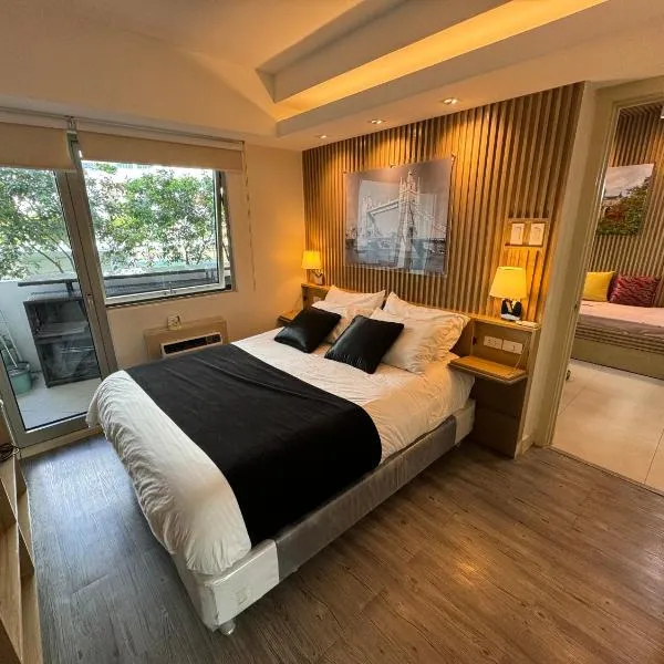 Nice one BR condo free pool in Commonwealth QC, hotel in Manila