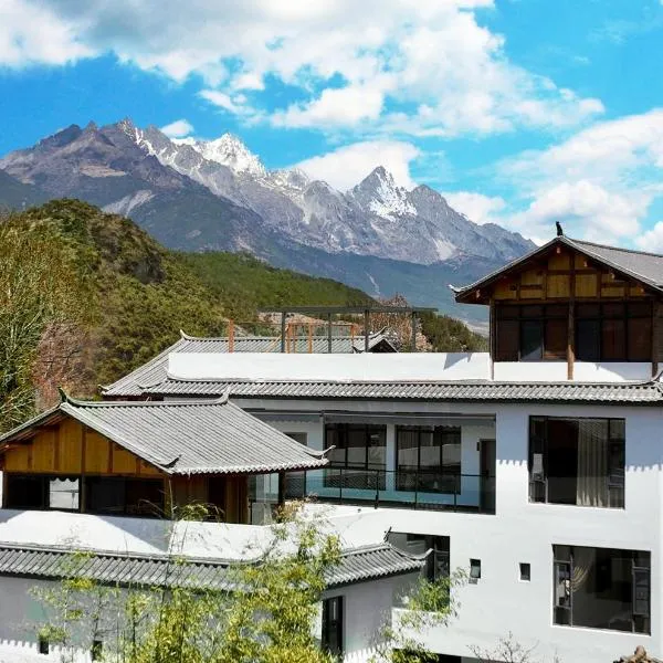 Lijiang Hengchang Baoyin Mohuakai Inn, hôtel à Lijiang