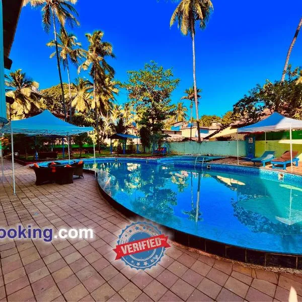 Hotel The Golden Shivam Resort - Big Swimming Pool Resort In Goa, hotel em Goa