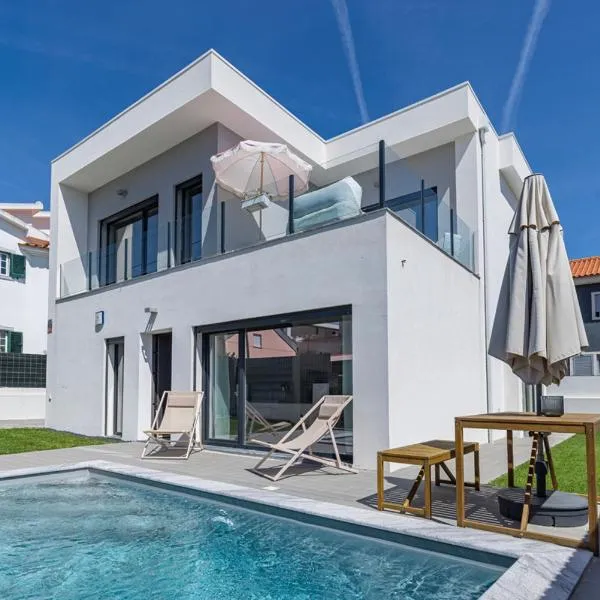 Poolside oasis by Caparica beach โรงแรมในชาร์เนกา