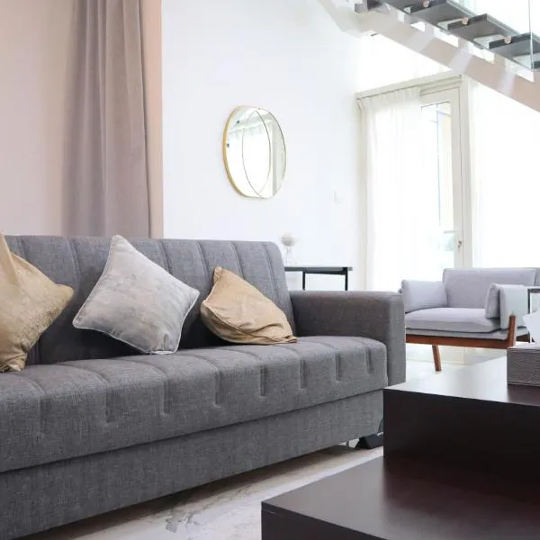 Luxury 2BR Duplex Oasis in Masdar City - Stylish Retreat Near Masdar Park & City Centre, hotel in Abu Dhabi