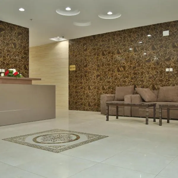 أندلسية الوسام, hotel u gradu Taif
