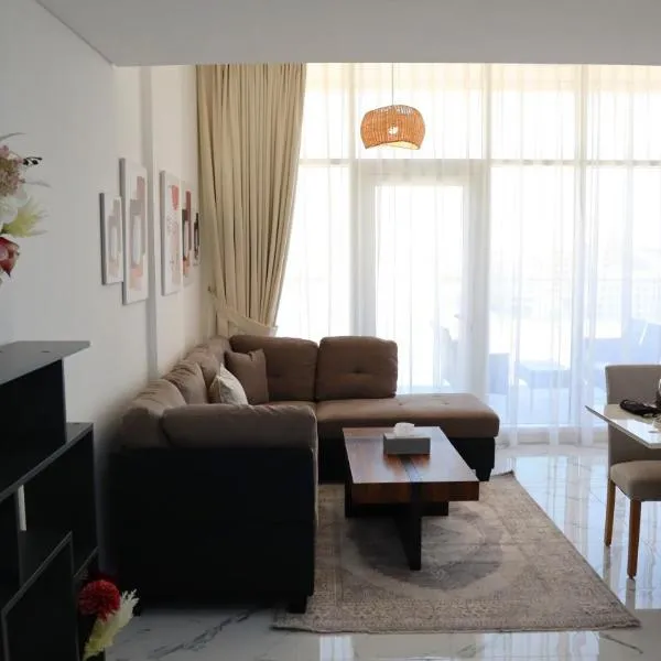 Wanderlust 2BR Escape in Masdar City - Cozy Retreat Near Masdar Park & City Centre, hotel in Abu Dhabi
