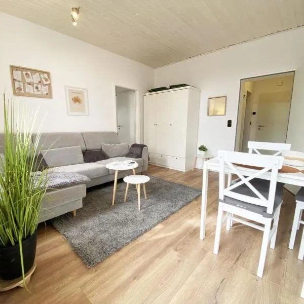 Ferien im Wangerland - Haus Wiesenweg - Ferienwohnung 1 1OG, hotel in Horumersiel