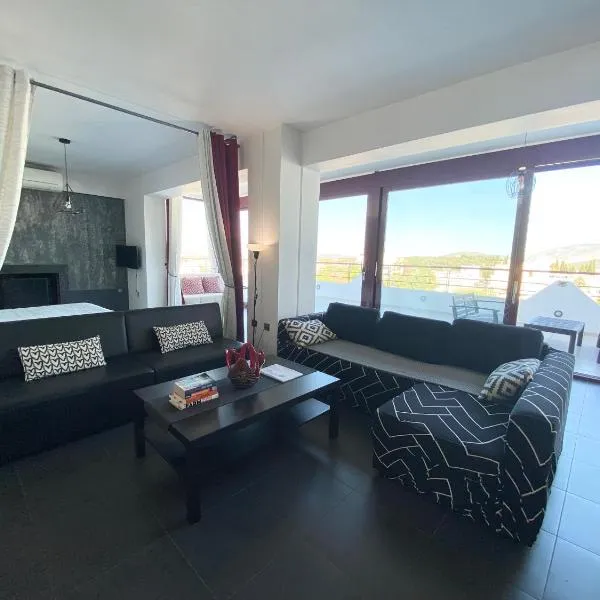 Luxury view apartment 10min from Athens airport, מלון בקורופיון