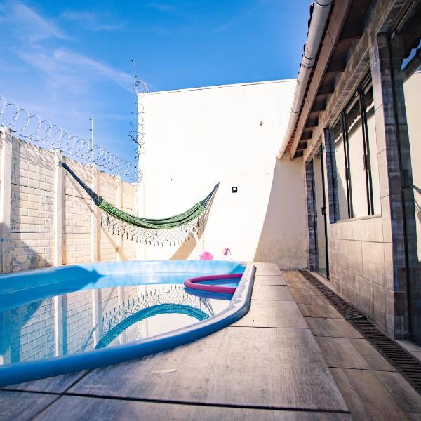 Casa 3 min Shopping Pelotas- Com 1 Suíte, 2 Quartos Climatizados, Piscina e Estacionamento 2 carros - Foto 4