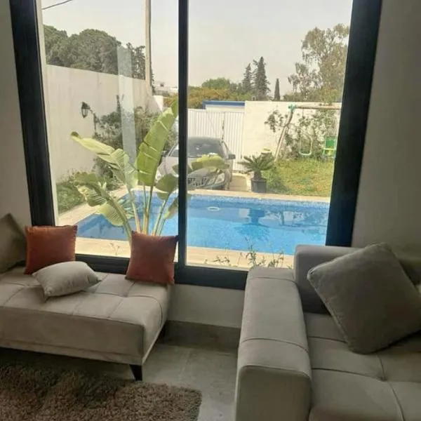 Coquette villa avec piscine, hotel v destinaci Tunis