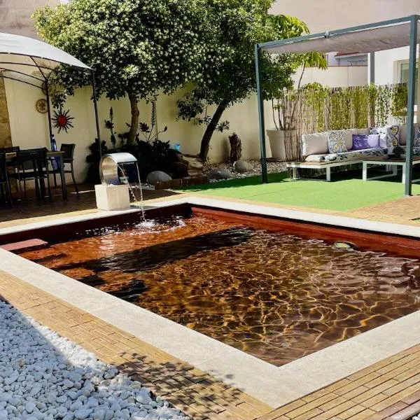 Villa Paradise, urban oasis by -Toprentalsbarcelona-, хотел в Есплугес де Лобрегат