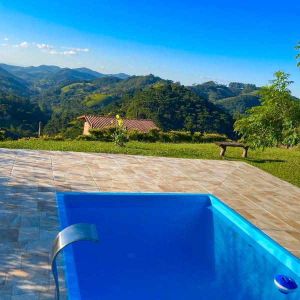 Casa com churrasqueira , piscina e vista espetacular