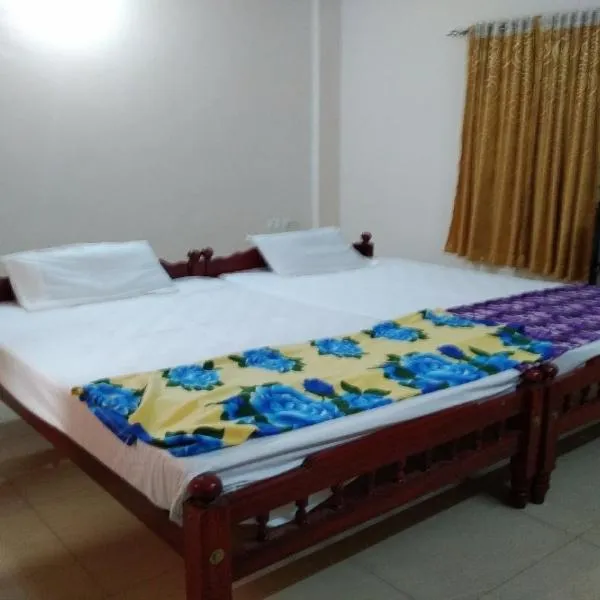 SPOT ON Sana Tourist Home, hotel in Kattanam