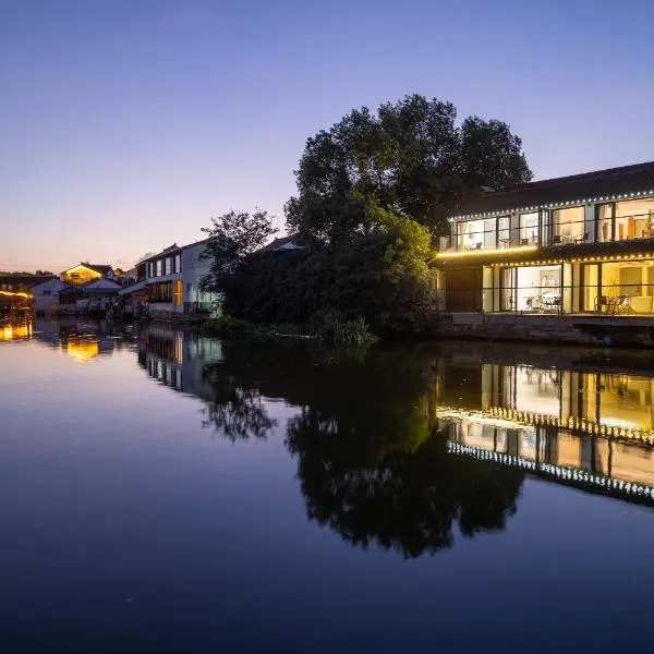 Tongli Slowlife River View Inn, hôtel à Shangta