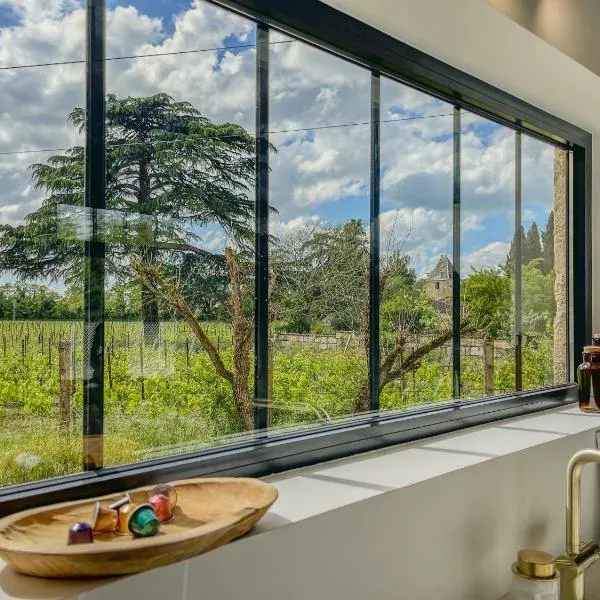 Maison girondine cosy avec jardin et vue vigne - proche St-Émilion, hotel en Libourne