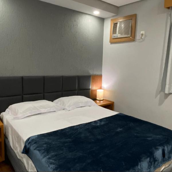 Flat confortável com recepção 24h e vaga de garagem
