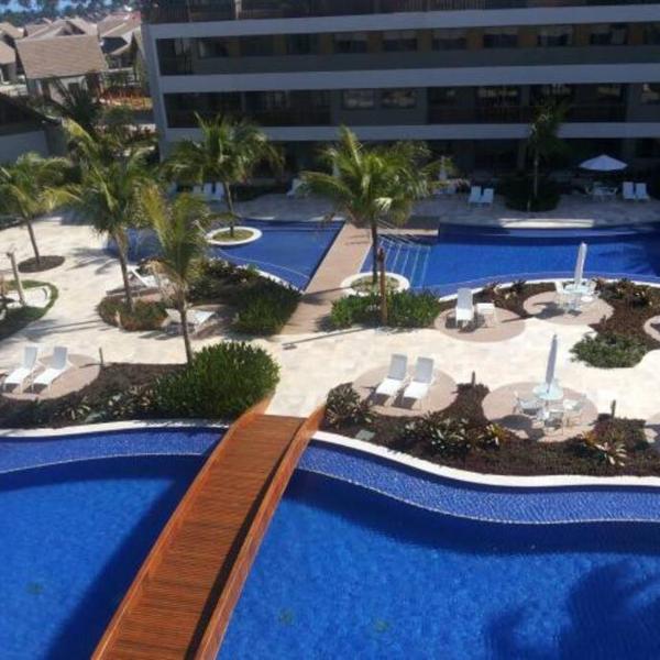 Flat Decorado a beira da piscina no melhor condominio de Muro Alto