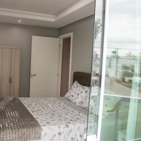 Studio com Ar-Condicionado e Wi-Fi em Biguaçu SC, хотел в Бигуасу