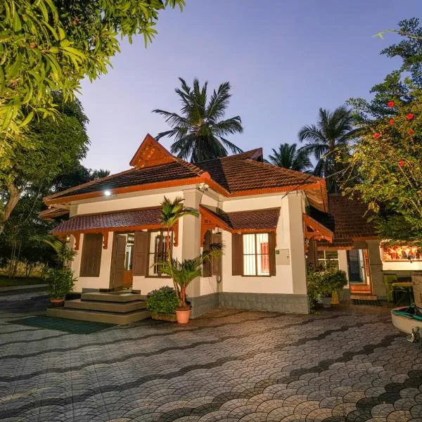 Pop Tavern Private Pool Villa Kovalam by VOYE HOMES, hotel a Kovalam