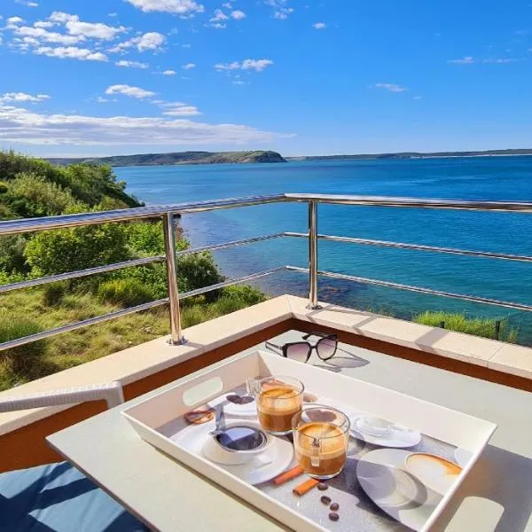 Apartments Nicolas - Beach & Sea 10m away - Amazing sea view!, hotel in Rtina