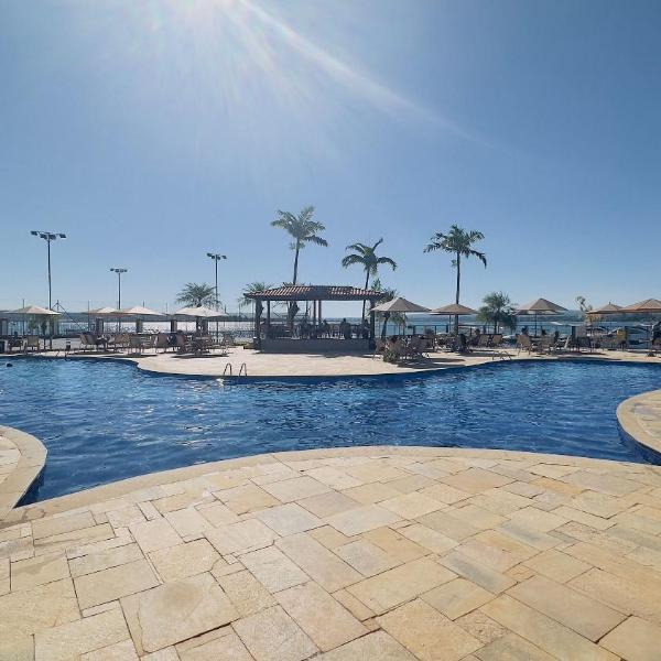 Charmoso flat 105 beira lago