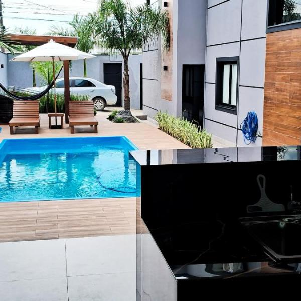 Sobrado com 3 Suítes, Piscina, Sala de Jogos, Garagem para 4 Carros