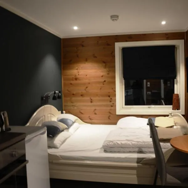 Fossheim Lodge - arealeffektiv minileilighet, hotel in Torset