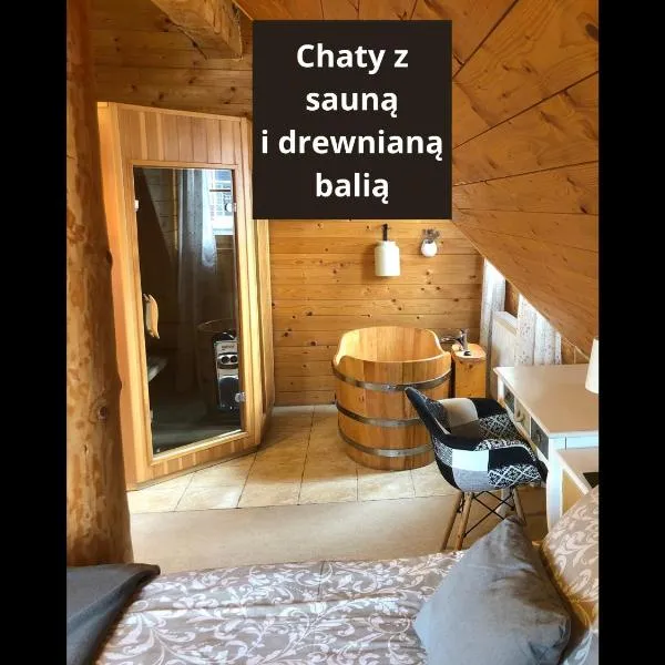 Chaty Świerkowe Wzgórze - domki typu superior z sauną balią kominkiem i domki-bez sauny balii kominka, khách sạn ở Karpacz