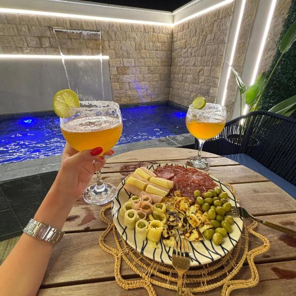 Studio luxo com piscina privativa e cascata no centro de porto de galinhas!