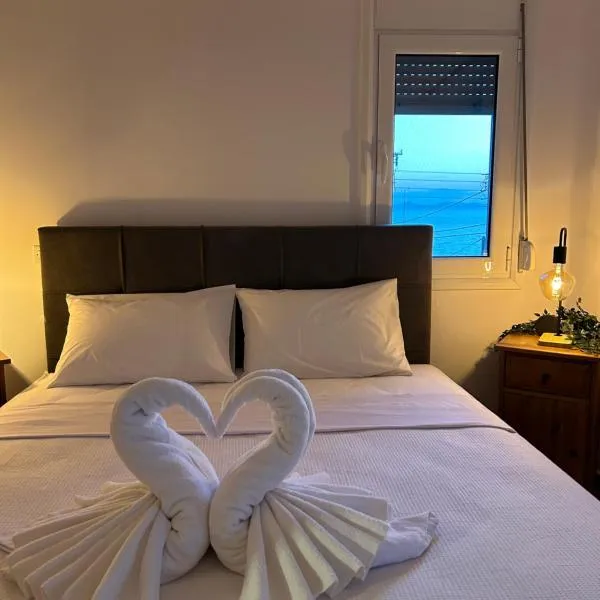 Sunny Modern Beach Retreat Steps from the Shore, hotel Saronida városában
