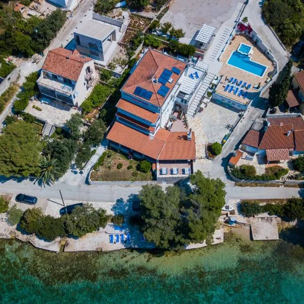 Boutique Guesthouse Sveti Petar, on the beach, heated pool, restaurant & boat berth - ADULT ONLY, hotel in Nečujam