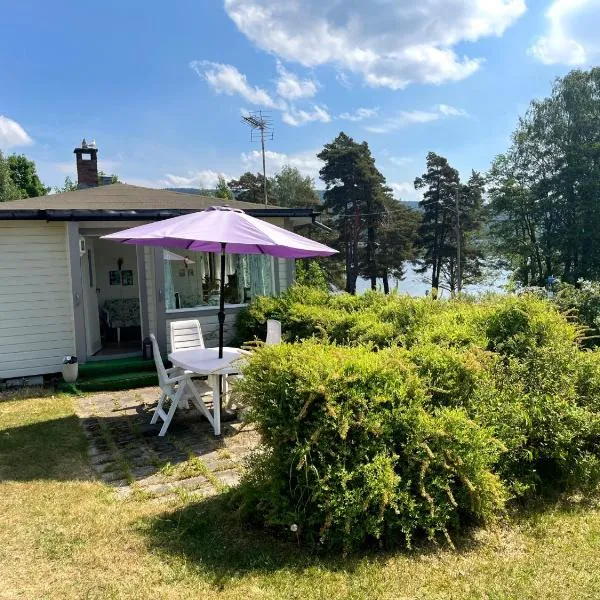 Furuly by Norgesbooking - cabin 20 meters from the beach, viešbutis mieste Hyggen