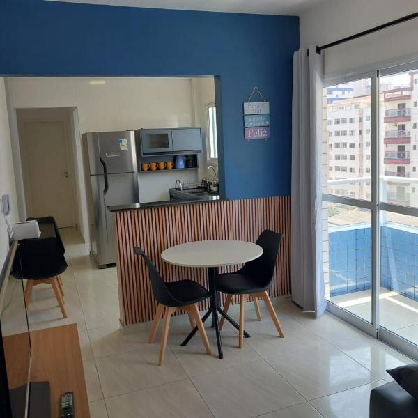 066 Aviação Beira MAR com varanda - 1 dorm - 15 metros da praia - WI FI - Garagem Gratuita