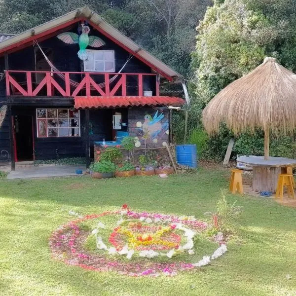 Cabaña Colibri naturaleza vista Laguna de la Cocha, hotel El Encanóban
